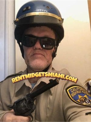 Little person entertainer dressed as a motorcycle patrol character at a Miami event