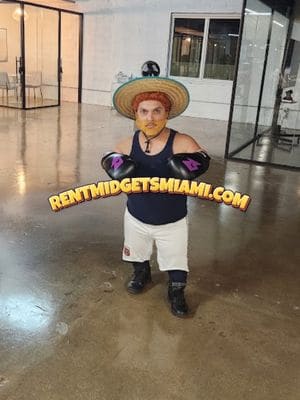 Little person boxing character posing at a themed entertainment appearance in Miami, Florida