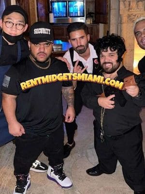 Little people performers dressed in security-themed costumes posing at a private nightclub event