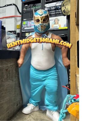 Masked little person wrestler in costume for a themed entertainment event in Miami, Florida