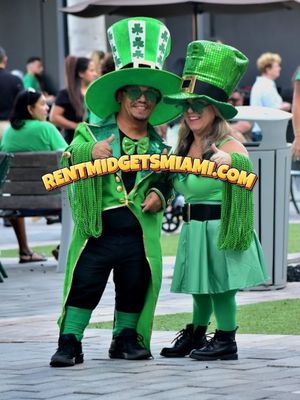 Little people entertainers dressed as leprechauns for a St. Patrick’s Day themed party