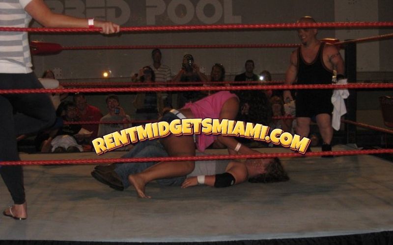 Group of micro wrestlers posing together at a South Florida wrestling event