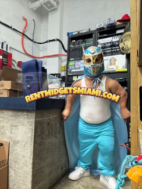 Miami micro wrestler making a dramatic entrance during a live event