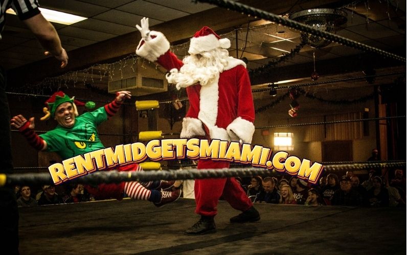 Santa Claus tossing a small elf wrestler during a funny micro wrestling match in Miami
